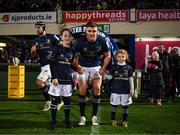 16 December 2022; Leinster captain Garry Ringrose with match day mascots Brian Lynch, aged 11, and Aine Hartnett, aged six, at the Heineken Champions Cup match between Leinster and Gloucester at the RDS Arena in Dublin. Photo by Harry Murphy/Sportsfile