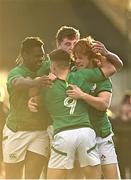 17 December 2022; Henry McErlean of Ireland, right, celebrates with team-mates after scoring his side's fourth try during the U20 Rugby International Friendly match between Ireland and Italy at Clontarf RFC in Dublin. Photo by Sam Barnes/Sportsfile