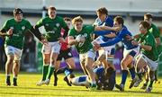 17 December 2022; Hugh Gavin of Ireland is tackled by Marco Scalabrin, right, and David Odiase, both of Italy, during the U20 Rugby International Friendly match between Ireland and Italy at Clontarf RFC in Dublin. Photo by Sam Barnes/Sportsfile