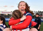 17 December 2022; Ella Durkan, back, and Alison Coleman of Blackrock College celebrate after their side's victory in the Energia AIL Women's Division Final match between Blackrock College and Railway Union at Energia Park in Dublin. Photo by Seb Daly/Sportsfile