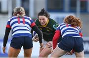 17 December 2022; Lindsay Peat of Railway Union in action against Anna Doyle, left, and Ella Durkan of Blackrock College during the Energia AIL Women's Division Final match between Blackrock College and Railway Union at Energia Park in Dublin. Photo by Seb Daly/Sportsfile