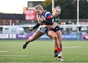 17 December 2022; Anna Doyle of Blackrock College is tackled by Stephanie Carroll of Railway Union on her way to scoring her side's fourth try during the Energia AIL Women's Division Final match between Blackrock College and Railway Union at Energia Park in Dublin. Photo by Seb Daly/Sportsfile