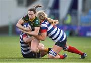 17 December 2022; Niamh Byrne of Railway Union is tackled by Enya Breen and Dorothy Wall of Blackrock College during the Energia AIL Women's Division Final match between Blackrock College and Railway Union at Energia Park in Dublin. Photo by Seb Daly/Sportsfile