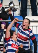 17 December 2022; Blackrock College captain Michelle Claffey lifts the trophy after her side's victory in the Energia AIL Women's Division Final match between Blackrock College and Railway Union at Energia Park in Dublin. Photo by Seb Daly/Sportsfile