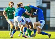 17 December 2022; James McNabney of Ireland is tackled by Lorenzo Elettri, left, and Marco Scalabrin, both of Italy, during the U20 Rugby International Friendly match between Ireland and Italy at Clontarf RFC in Dublin. Photo by Sam Barnes/Sportsfile