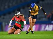 17 December 2022; Niamh Deely of James Stephens in action against Jenna Boden of Clonduff during the AIB All-Ireland Intermediate Camogie Club Championship Final match between Clonduff of Down and James Stephens of Kilkenny at Croke Park in Dublin. Photo by Piaras Ó Mídheach/Sportsfile