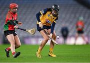 17 December 2022; Cassie Fitzpatrick of Clonduff in action against Anna Doheny of James Stephens during the AIB All-Ireland Intermediate Camogie Club Championship Final match between Clonduff of Down and James Stephens of Kilkenny at Croke Park in Dublin. Photo by Piaras Ó Mídheach/Sportsfile
