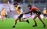 17 December 2022; Sara Louise Graffin of Clonduff in action against Molly Burke of James Stephens during the AIB All-Ireland Intermediate Camogie Club Championship Final match between Clonduff of Down and James Stephens of Kilkenny at Croke Park in Dublin.  Photo by Stephen Marken/Sportsfile