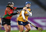 17 December 2022; Orla Gribben of Clonduff in action against Emma Gaffney of James Stephens during the AIB All-Ireland Intermediate Camogie Club Championship Final match between Clonduff of Down and James Stephens of Kilkenny at Croke Park in Dublin. Photo by Piaras Ó Mídheach/Sportsfile