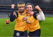 17 December 2022; Beth Fitzpatrick, left, and Niamh Fitzpatrick of Clonduff celebrate after their side's victory in the AIB All-Ireland Intermediate Camogie Club Championship Final match between Clonduff of Down and James Stephens of Kilkenny at Croke Park in Dublin. Photo by Piaras Ó Mídheach/Sportsfile