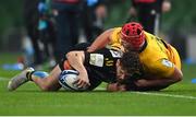 17 December 2022; Tawera Kerr Barlow of La Rochelle is tackled by Tom Stewart of Ulster during the Heineken Champions Cup Pool B Round 2 match between Ulster and La Rochelle at Aviva Stadium in Dublin. Photo by Ramsey Cardy/Sportsfile