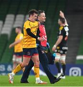17 December 2022; Billy Burns of Ulster leaves the pitch with an injury during the Heineken Champions Cup Pool B Round 2 match between Ulster and La Rochelle at Aviva Stadium in Dublin. Photo by Ramsey Cardy/Sportsfile
