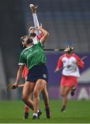 17 December 2022; Niamh McGrath of Sarsfields in action against Lucia McNaughton of Loughgiel Shamrocks during the AIB All-Ireland Senior Camogie Club Championship Final match between Sarsfields of Galway and Loughgiel Shamrocks of Antrim at Croke Park in Dublin. Photo by Piaras Ó Mídheach/Sportsfile