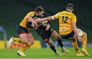 17 December 2022; Antoine Hastoy of La Rochelle is tackled by Tom Stewart, left, and Stuart McCloskey of Ulster during the Heineken Champions Cup Pool B Round 2 match between Ulster and La Rochelle at Aviva Stadium in Dublin. Photo by Ramsey Cardy/Sportsfile