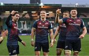 18 December 2022; Munster players, from left, Joey Carbery, Mike Haley, Gavin Coombes and Jack O'Donoghue after their side's victory in the Heineken Champions Cup Pool B Round 2 match between Northampton Saints and Munster at Franklin's Gardens in Northampton, England. Photo by Seb Daly/Sportsfile