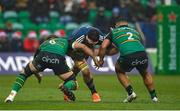 18 December 2022; Jean Kleyn of Munster is tackled by Angus Scott-Young, left, and Sam Matavesi of Northampton Saints during the Heineken Champions Cup Pool B Round 2 match between Northampton Saints and Munster at Franklin's Gardens in Northampton, England. Photo by Seb Daly/Sportsfile