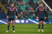 18 December 2022; Joey Carbery, left, and Jack Crowley of Munster during the Heineken Champions Cup Pool B Round 2 match between Northampton Saints and Munster at Franklin's Gardens in Northampton, England. Photo by Seb Daly/Sportsfile