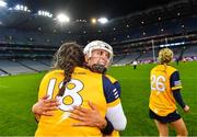17 December 2022; Clonduff players Claire Kearney, behind, and Niamh Fitzpatrick celebrate after their side's victory in the AIB All-Ireland Intermediate Camogie Club Championship Final match between Clonduff of Down and James Stephens of Kilkenny at Croke Park in Dublin. Photo by Piaras Ó Mídheach/Sportsfile