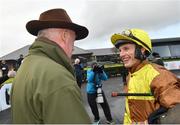19 December 2022; Paul Townend with trainer Willie Mullins after winning the John Durkan Memorial Punchestown Steeplechase on Galopin Des Champs at Punchestown Racecourse in Naas, Kildare. Photo by David Fitzgerald/Sportsfile