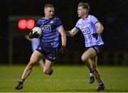 21 December 2022; Ciarán Kilkenny of Dublin West, left, in action against Adam Fearon of Dublin Development Squad during the Dave Hickey Plate Final match between Dublin West and Dublin Development Squad at the Dublin City University Sports Campus in Dublin. Photo by Seb Daly/Sportsfile