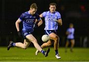 21 December 2022; Senan Forker of Dublin West, left, in action against Karl Lynch Bissett of Dublin Development Squad during the Dave Hickey Plate Final match between Dublin West and Dublin Development Squad at the Dublin City University Sports Campus in Dublin. Photo by Seb Daly/Sportsfile