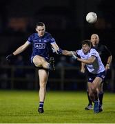 21 December 2022; Brian Fenton of Dublin North in action against Alex Gavin of Dublin South during the Dave Hickey Cup Final match between Dublin North and Dublin South at the Dublin City University Sports Campus in Dublin. Photo by Seb Daly/Sportsfile