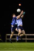 21 December 2022; Alan Murphy of Dublin West, left, in action against Colm Basquel of Dublin Development Squad during the Dave Hickey Plate Final match between Dublin West and Dublin Development Squad at the Dublin City University Sports Campus in Dublin. Photo by Seb Daly/Sportsfile