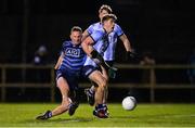 21 December 2022; Ciarán Kilkenny of Dublin West, left, in action against Greg McEneaney of Dublin Development Squad during the Dave Hickey Plate Final match between Dublin West and Dublin Development Squad at the Dublin City University Sports Campus in Dublin. Photo by Seb Daly/Sportsfile