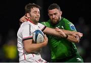 23 December 2022; Iain Henderson of Ulster is tackled by Josh Murphy of Connacht during the United Rugby Championship match between Connacht and Ulster at The Sportsground in Galway. Photo by Piaras Ó Mídheach/Sportsfile