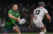 23 December 2022; Jack Carty of Connacht passes under pressure from Luke Marshall of Ulster during the United Rugby Championship match between Connacht and Ulster at The Sportsground in Galway. Photo by Piaras Ó Mídheach/Sportsfile