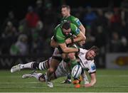 23 December 2022; Josh Murphy of Connacht is tackled by Iain Henderson of Ulster during the United Rugby Championship match between Connacht and Ulster at The Sportsground in Galway. Photo by Piaras Ó Mídheach/Sportsfile