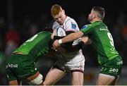 23 December 2022; Nathan Doak of Ulster is tackled by Jarrad Butler, left, and Caolin Blade of Connacht during the United Rugby Championship match between Connacht and Ulster at The Sportsground in Galway. Photo by Piaras Ó Mídheach/Sportsfile