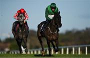 26 December 2022; Dark Raven, right, with Paul Townend up, on their way to winning the Thorntons Recycling Maiden Hurdle on day one of the Leopardstown Christmas Festival at Leopardstown Racecourse in Dublin. Photo by Seb Daly/Sportsfile