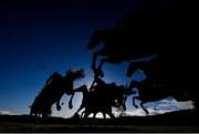 26 December 2022; Runners and riders jump the first during the Thorntons Recycling Maiden Hurdle on day one of the Leopardstown Christmas Festival at Leopardstown Racecourse in Dublin. Photo by Seb Daly/Sportsfile