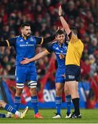 26 December 2022; Ross Byrne and Max Deegan, left, of Leinster remonstrates with referee Chris Busby during the United Rugby Championship match between Munster and Leinster at Thomond Park in Limerick. Photo by Piaras Ó Mídheach/Sportsfile