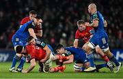26 December 2022; Jean Kleyn of Munster is tackled by Scott Penny of Leinster during the United Rugby Championship match between Munster and Leinster at Thomond Park in Limerick. Photo by Eóin Noonan/Sportsfile