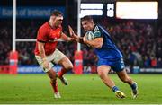 26 December 2022; Scott Penny of Leinster is tackled by Dave Kilcoyne of Munster during the United Rugby Championship match between Munster and Leinster at Thomond Park in Limerick. Photo by Eóin Noonan/Sportsfile