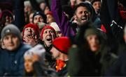 26 December 2022; Munster supporters celebrate a try during the United Rugby Championship match between Munster and Leinster at Thomond Park in Limerick. Photo by Eóin Noonan/Sportsfile