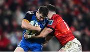 26 December 2022; Luke McGrath of Leinster in action against Calvin Nash of Munster during the United Rugby Championship match between Munster and Leinster at Thomond Park in Limerick. Photo by Eóin Noonan/Sportsfile