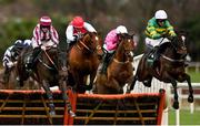 27 December 2022; Tekao, right, with Mark Walsh up, jumps the last on their way to winning the Paddy Power Maiden Hurdle, from second place Ascending, left, with Rachael Blackmore up, on day two of the Leopardstown Christmas Festival at Leopardstown Racecourse in Dublin. Photo by Seb Daly/Sportsfile