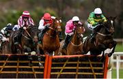 27 December 2022; Tekao, right, with Mark Walsh up, jumps the last on their way to winning the Paddy Power Maiden Hurdle, from second place Ascending, left, with Rachael Blackmore up, on day two of the Leopardstown Christmas Festival at Leopardstown Racecourse in Dublin. Photo by Seb Daly/Sportsfile