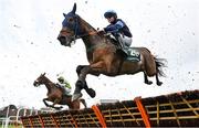 27 December 2022; Power To Love, with Kevin Sexton up, jumps the first during the Paddy Power Maiden Hurdle on day two of the Leopardstown Christmas Festival at Leopardstown Racecourse in Dublin. Photo by Seb Daly/Sportsfile