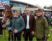 27 December 2022; An Taoiseach Leo Varadkar, centre, with trainer Willie Mullins and winning horse Facile Vega after the Paddy Power Future Champions Novice Hurdle on day two of the Leopardstown Christmas Festival at Leopardstown Racecourse in Dublin. Photo by Seb Daly/Sportsfile