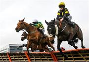 27 December 2022; One Last Tango, left, with Mark Walsh up, and Watch House Cross, with Rachael Blackmore up, jump the last on their way to finishing third and fifth respectively during the Paddy Power Handicap Hurdle on day two of the Leopardstown Christmas Festival at Leopardstown Racecourse in Dublin. Photo by Seb Daly/Sportsfile