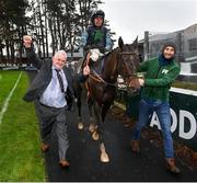 27 December 2022; Owner Tadhg Moynihan, left, celebrates after sending out Real Steel and jockey Conor McNamara to win the Paddy Power Extended Handicap Steeplechase on day two of the Leopardstown Christmas Festival at Leopardstown Racecourse in Dublin. Photo by Seb Daly/Sportsfile