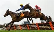 28 December 2022; Lot of Joy, left, with Paul Townend up, and Firm Footings, with Jack Kennedy up, jump the last on their way to finishing second and third respectively, from winner Deep Cave, behind, with Rachael Blackmore up, during the Savills Maiden Hurdle on day three of the Leopardstown Christmas Festival at Leopardstown Racecourse in Dublin. Photo by Seb Daly/Sportsfile