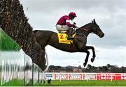 28 December 2022; Conflated, with Jack Kennedy up, jumps the last during the first circuit on their way to winning the Savills Steeplechase on day three of the Leopardstown Christmas Festival at Leopardstown Racecourse in Dublin. Photo by Seb Daly/Sportsfile