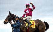 28 December 2022; Jockey Jack Kennedy and groom Camila Sharples celebrate with Conflated after winning the Savills Steeplechase on day three of the Leopardstown Christmas Festival at Leopardstown Racecourse in Dublin. Photo by Seb Daly/Sportsfile