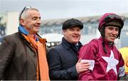 28 December 2022; Owner Michael O'Leary, left, trainer Gordon Elliott, behind, and jockey Jack Kennedy after winning the Savills Steeplechase with Conflated on day three of the Leopardstown Christmas Festival at Leopardstown Racecourse in Dublin. Photo by Seb Daly/Sportsfile