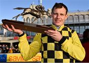 29 December 2022; Jockey Paul Townend with the trophy after winning the Matheson Hurdle on State Man during day four of the Leopardstown Christmas Festival at Leopardstown Racecourse in Dublin. Photo by Seb Daly/Sportsfile